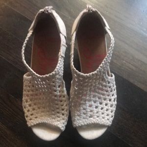 Cream colored fabric cork wedges